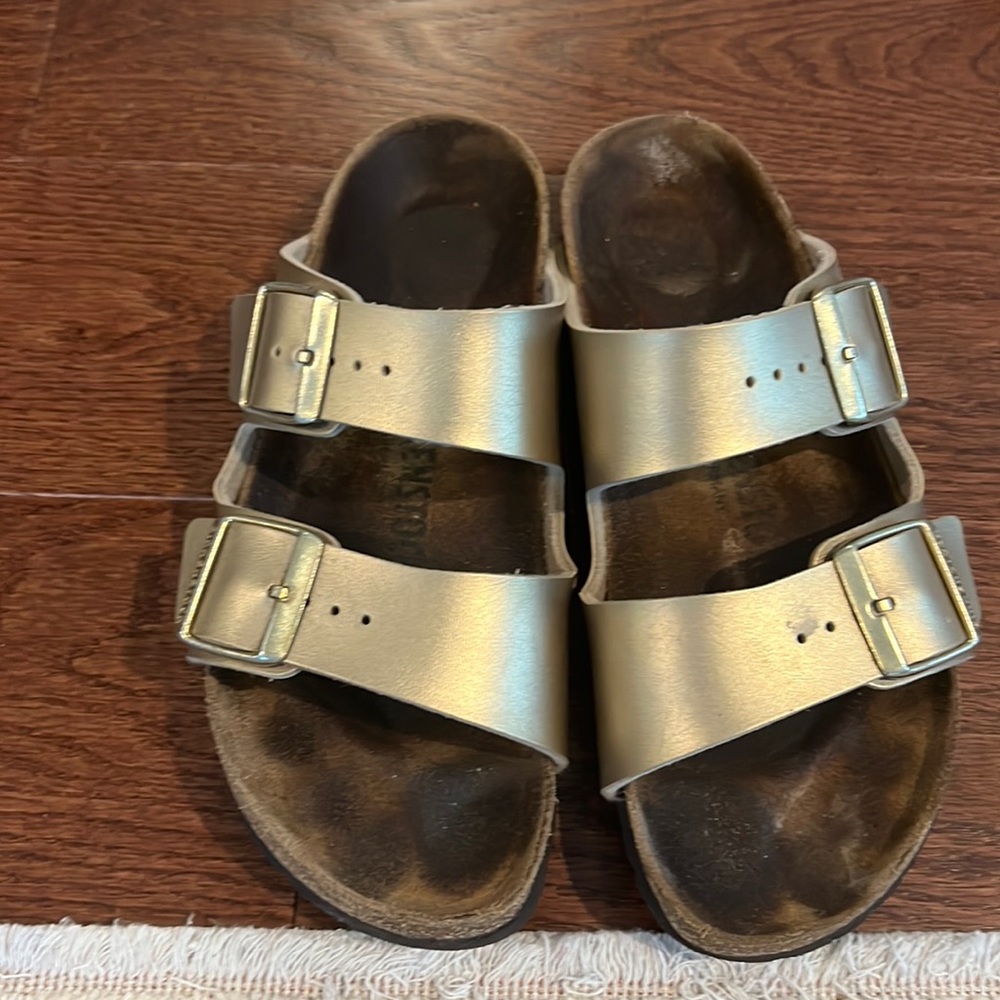 Well loved gold birkenstock Arizona slide Size 37